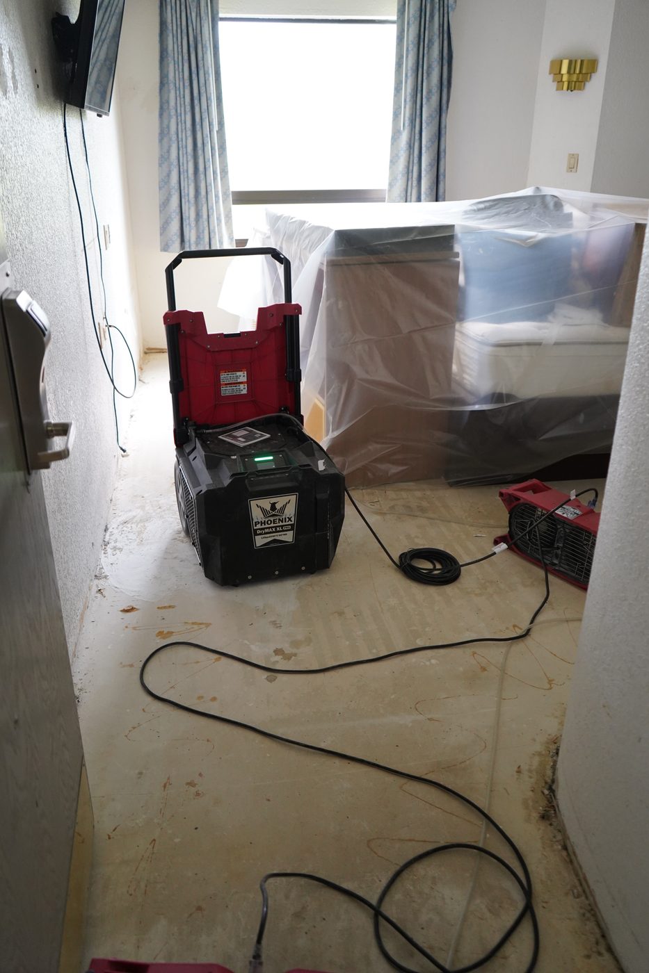 Commercial dehumidifier running in a Waterford property